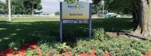 Read more about the article Red mulch added to North Park pollinator garden